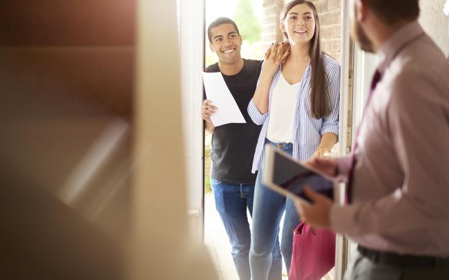 couple interacting with their realtor